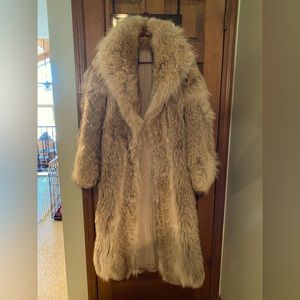 Womens full length Coyote coat. Fits size XL. About 50” long. 24” pit to pit.